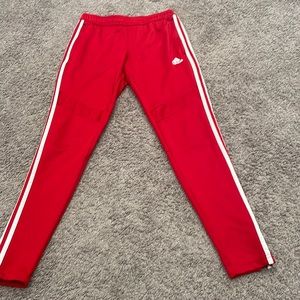 Red and White adidas track pants
